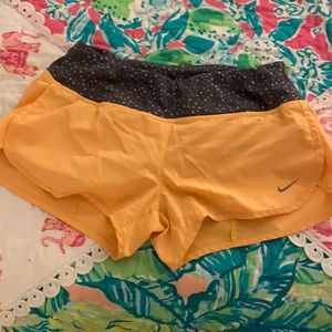 neon light orange Nike dry fit shorts